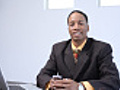 Portrait of businessman sitting at desk | BahVideo.com