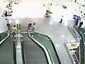 Man Saves Kid Falling Off Escalator | BahVideo.com
