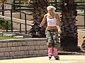 Beautiful Blonde Rollerblading Outdoors Stock  | BahVideo.com