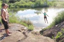Girl Flies Into Lake Off Bike Jump | BahVideo.com