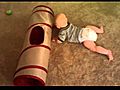 Baby Tyler meets the kitty tunnel | BahVideo.com