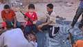 Children clean Libyan rebels weapons | BahVideo.com