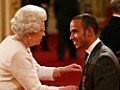 Lewis Hamilton receives his MBE | BahVideo.com