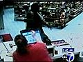 Deli customer clocks robber with bottle | BahVideo.com