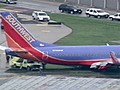 Plane slides off Chicago runway | BahVideo.com