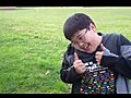 Asian throws grenade and smiles  | BahVideo.com