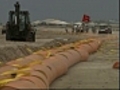 National Guard fills booms to keep oil away  | BahVideo.com