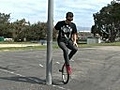 How to Ride a Unicycle Unicycle Wheel Walk Trick | BahVideo.com