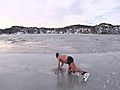 Crazy guy swims in ice cold lake | BahVideo.com