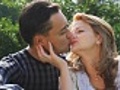 Couple sits in park and kisses | BahVideo.com