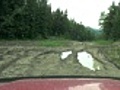 4x4 driving heavily rutted muddy trail | BahVideo.com