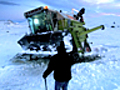 The boys a snow plough with a combine  | BahVideo.com
