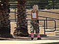 Beautiful Blonde Rollerblading Outdoors Stock  | BahVideo.com