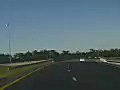 Royalty Free Stock Video SD Footage Car Travelling on a Highway in Jacksonville Florida | BahVideo.com