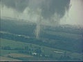 Tornado Up Close from a Helicopter Ripping Trees | BahVideo.com