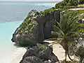Royalty Free Stock Video SD Footage Zoom Out to Mayan Ruins at Tulum in Mexico | BahVideo.com