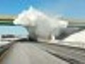 Snow-laden truck strikes bridge | BahVideo.com