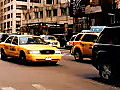 Royalty Free Stock Video HD Footage Cabs Pass by in New York City | BahVideo.com
