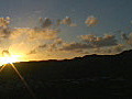 Royalty Free Stock Video HD Footage Pan Down to Dawn amp Sunrise over Diamond Head in Waikiki Beach Hawaii | BahVideo.com