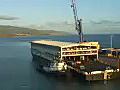 Royalty Free Stock Video HD Footage Tugboat and Barge Offloading Cars in the Harbor in Maui Hawaii | BahVideo.com