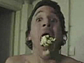 Man pops popcorn in his mouth | BahVideo.com