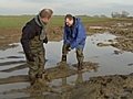 Paleontologists in Mud | BahVideo.com
