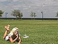 Beautiful Blonde Relaxes At Lakefront Park  | BahVideo.com