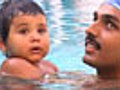15-month-old sets swimming record | BahVideo.com