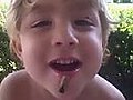 Three-Year-Old Plays with Cicada in his Mouth  | BahVideo.com