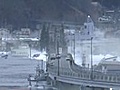 Tsunami engulfs Japan s port city after a  | BahVideo.com