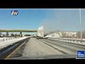 Snow Falls Off Truck On Highway | BahVideo.com