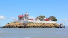 Couple Run Lighthouse Inn on Tiny Island | BahVideo.com
