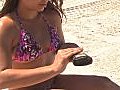 Bikini-clad Brunette On The Beach-1e Stock Footage | BahVideo.com