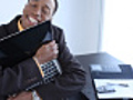Businessman hugging laptop computer | BahVideo.com