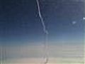 Plane passenger snaps photo of shuttle liftoff | BahVideo.com