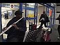 Playing the flute at O Hare Airport | BahVideo.com