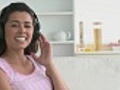 Smiling woman listening music | BahVideo.com