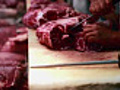 Butcher cutting meat  | BahVideo.com