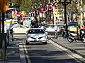 Royalty Free Stock Video HD Footage Zoom Out to Car Traveling on a Street in Barcelona Spain | BahVideo.com