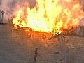 UNCUT Fire Bursts Through Home s Roof | BahVideo.com