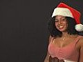 Beautiful Young Woman With A Santa s Helper Hat Stock Footage | BahVideo.com