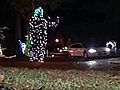 Woman Dons Holiday Lights Suit Dances | BahVideo.com