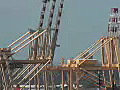 Royalty Free Stock Video HD Footage Close Up of Large Port Cranes at the Port of Honolulu in Hawaii | BahVideo.com