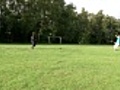 Adult and teen playing soccer | BahVideo.com