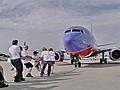 Hundreds Flex Muscles In Airplane Pull | BahVideo.com