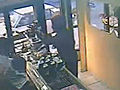 Robber Gets Smashed Through Glass Door | BahVideo.com