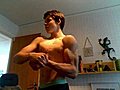 15 year old flexing Bicep | BahVideo.com