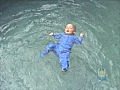 Infants 6 months to 12 months learn to roll onto their backs & float | BahVideo.com