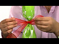 How to gift wrap a champagne bottle | BahVideo.com