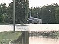 Flooding Floats A Few Caskets | BahVideo.com